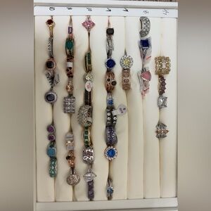Jewelry Collection with Rings, Earrings, and Necklaces